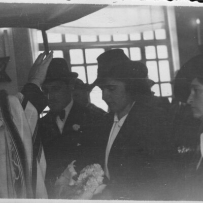 Salomon Neumann giving the priestly blessing to a newlywed couple in Quito Ecuador, 1944